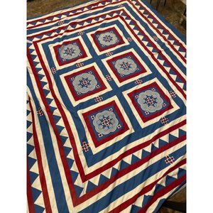 Vintage hand stitched and appliquéd geometric swirl patchwork quilt